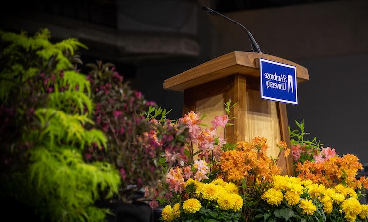 podium with flowers